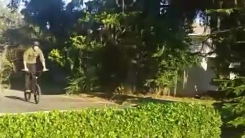 Guy in green crashes face plant