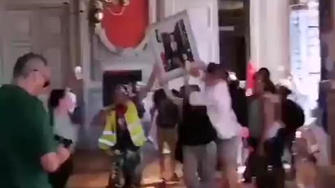 French Protesters in Poitiers removed Macron's portrait from Town Hall and threw it out the window