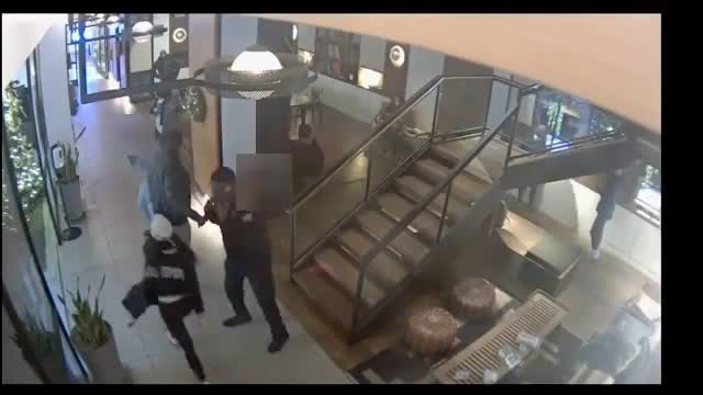 NYPD releases video of woman attacking Keyon Harrold Jr.