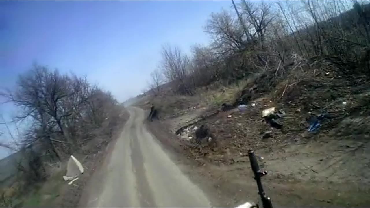 Russian soldiers successfully repel an FPV drone attack on their transport