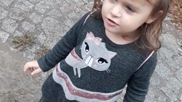 Sassy 2 year old. Puddle jumping.