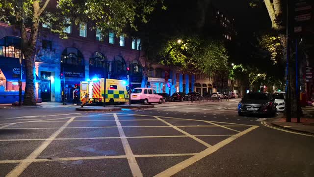 An Ambulance with Flashing Flashes When Answering an Emergency Call