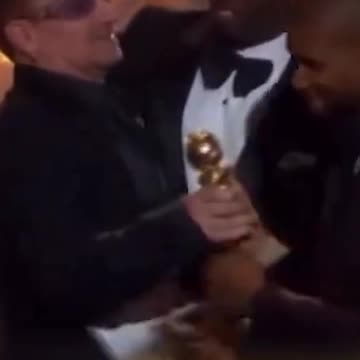 Bono dodges Diddy's kiss at Golden Globes in resurfaced clip