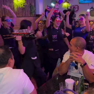 Dance Music Celebration in Club. Rocking party of girls.