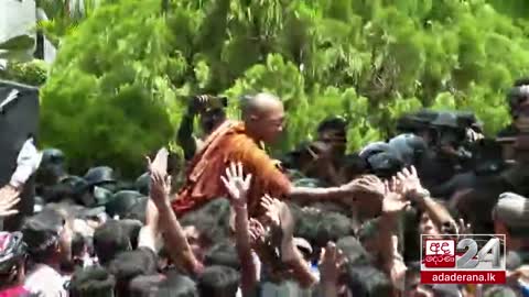 Anti-government protesters besiege and storm the prime minister's office in Sri Lanka's capital.