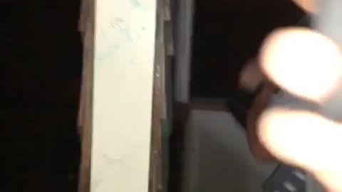 Teen in grey shirt throws television into street
