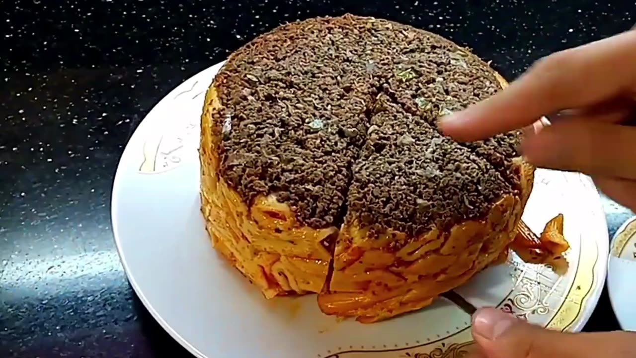 Cooking a pasta with meat طاجن مكرونه بالصلصة
