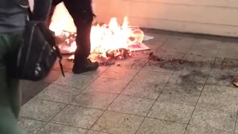 Fire in subway station put out by police officer