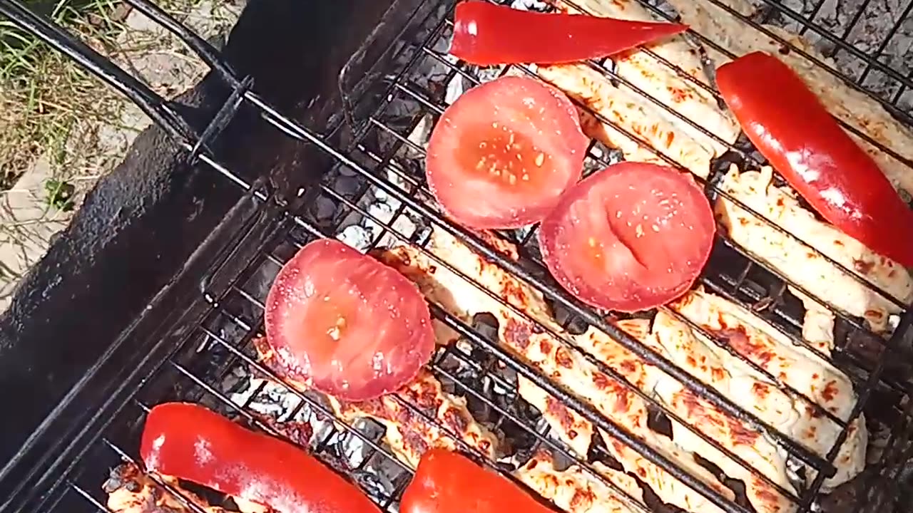 Grilling chicken and vegetables