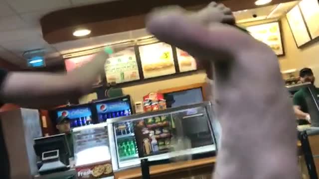 Shirtless pink shorts pizza slap