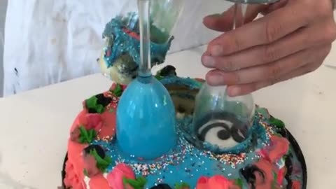 When he pulls the glasses out of the cake..