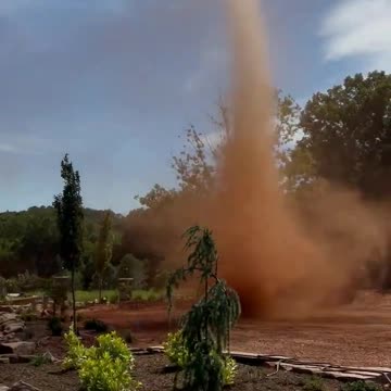 Red, twisty dust devil near Hickory, North Carolina