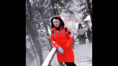 Man Troll Woman With Snow