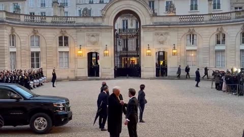 President DonaldTrump arrives at Élysée Palace and is greeted by President Macron