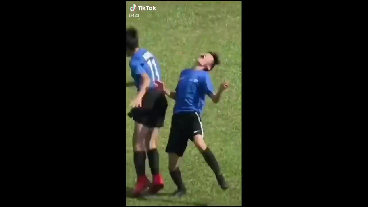 Boys gets hit in the face by teammate while celebrating goal
