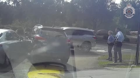 Driver attempts to ram and getaway from cops during confrontation