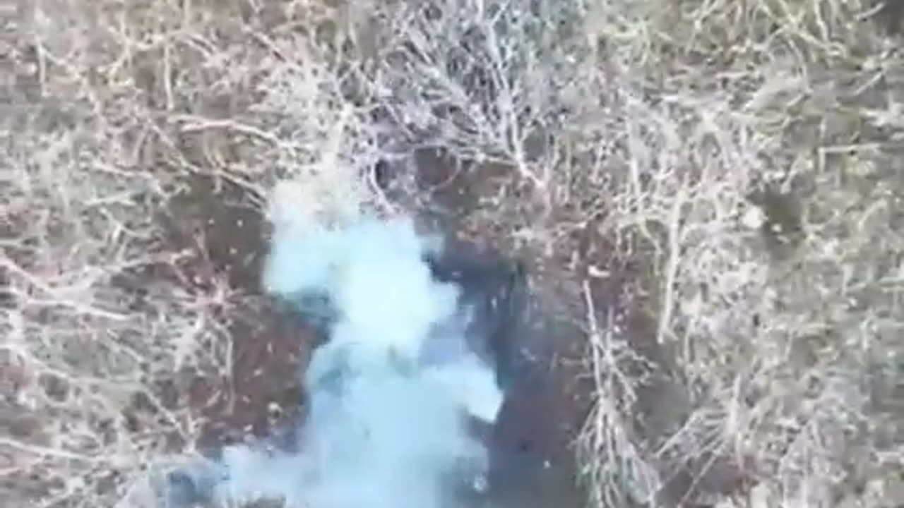 Ukrainian drone drop granade on the head of a Russian soldier, head flies off.