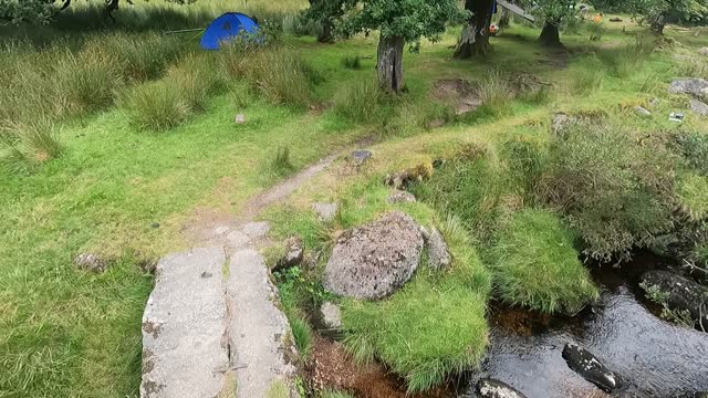 Crossing a river to camp