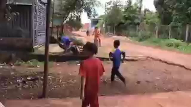 two young riders peel off the head of a big motorcycle