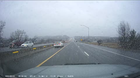 Distracted Driver Sends Tire into the Opposite Lane