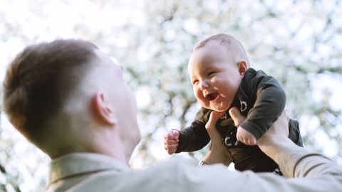 Cute baby with his father