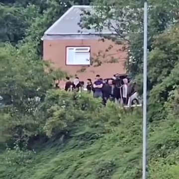 MDL ( Muslim defence League ) are waving knifes and Machetes