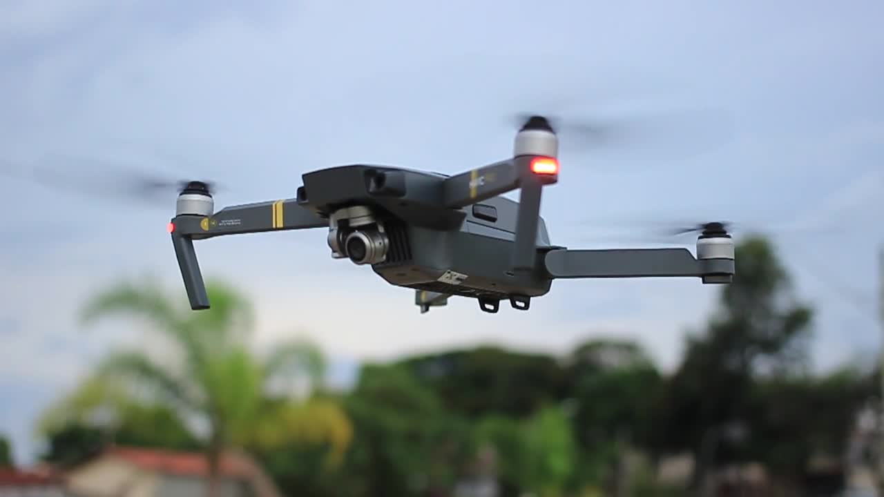 Full Shot And Close-up Footage Of A Flying Drone Machine