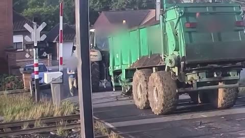 Train crashes into tractor trailer in Tournai, Belgium