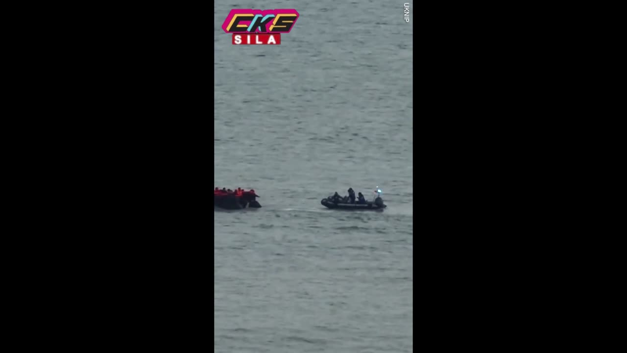 Moment French police ram speedboat into overcrowded migrant vessel