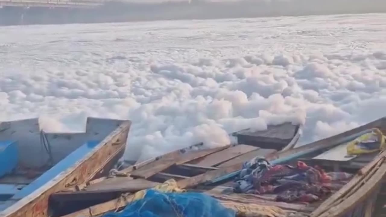 The Yamuna River in Delhi, India is covered with toxic foam from sewage and industrial waste