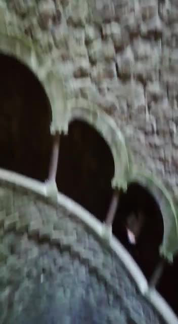 This small building is connected to a cave!