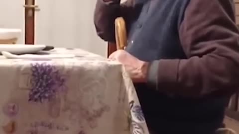 Grandad uses cane to drag bottle across table 🍷