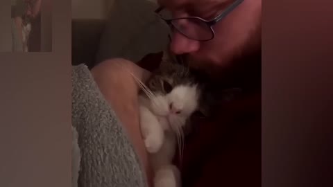 The male host goes to sleep with the cat