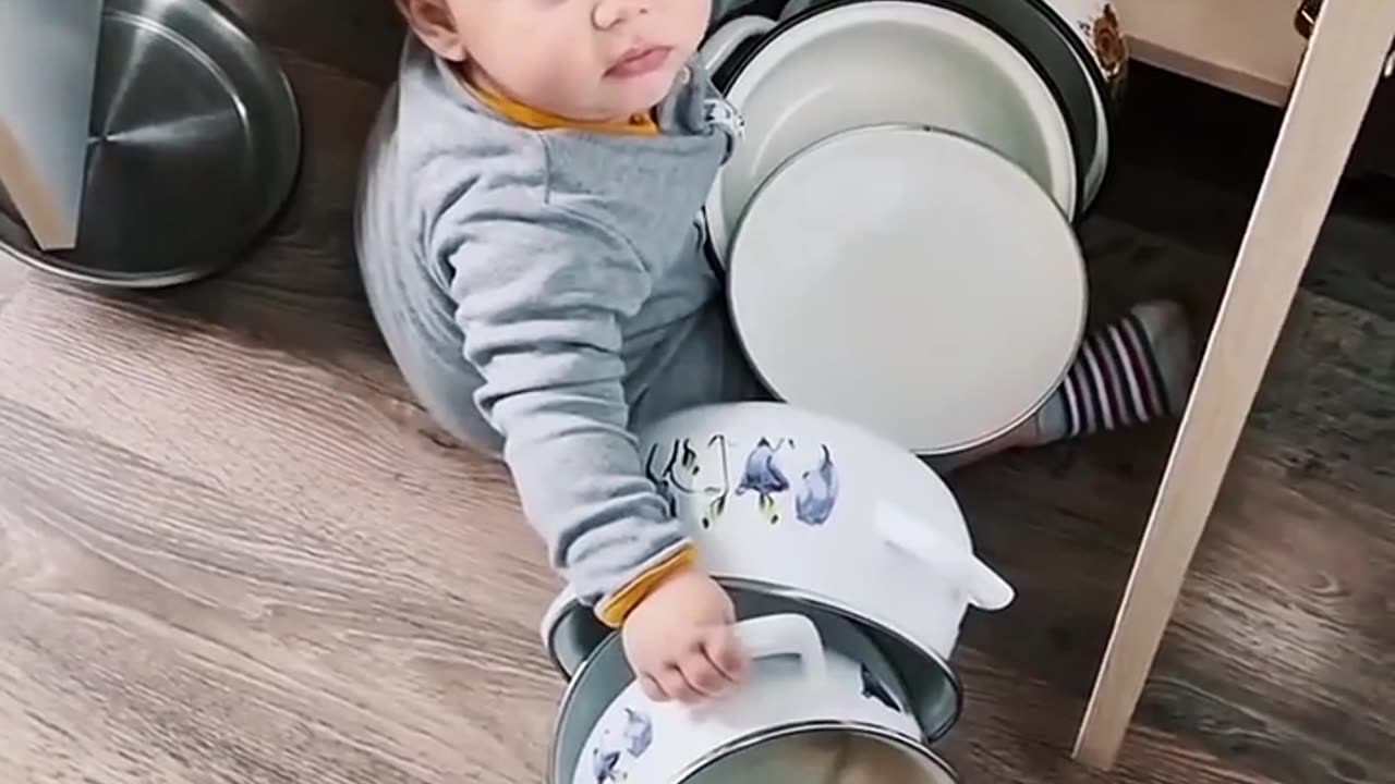 Funny Baby in kitchen