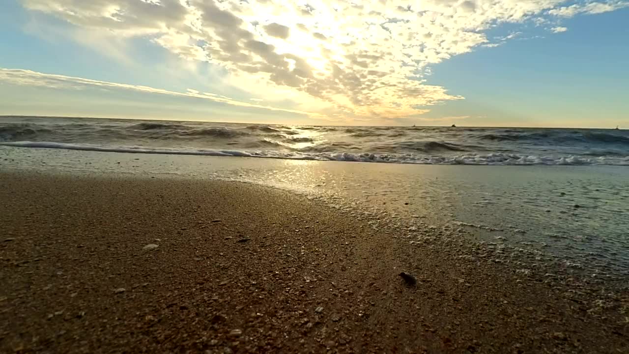 Sea waves coming to the beach, ground view