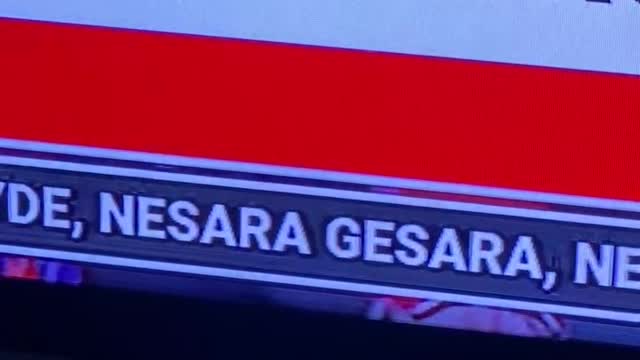 Nesara Gesara written out in the ticker below.