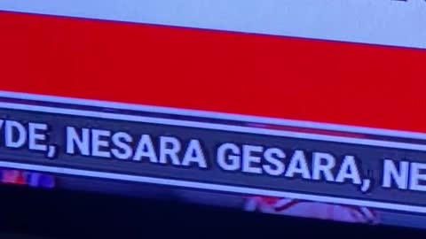 Nesara Gesara written out in the ticker below.