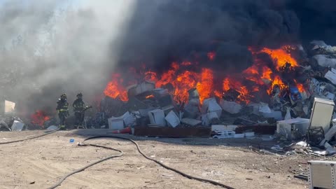 Two-Alarm Fire Engulfs Scrap Metal Yard In St. Petersburg