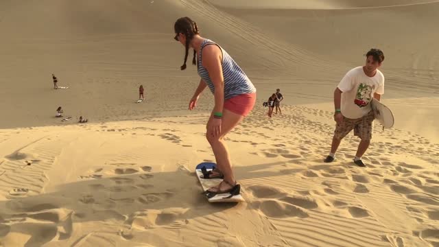 Sandboarding And Sand Sledding..funny video