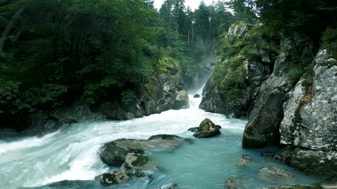 A Huge Water Stream Coming out of Mountains