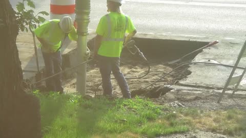 Vacuuming to Make a Hole in the Road