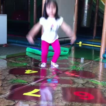 TamNhu having fun at the Monkey Playhouse