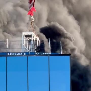 Huge Fire engulfs roof of high-rise building in Reading, UK..