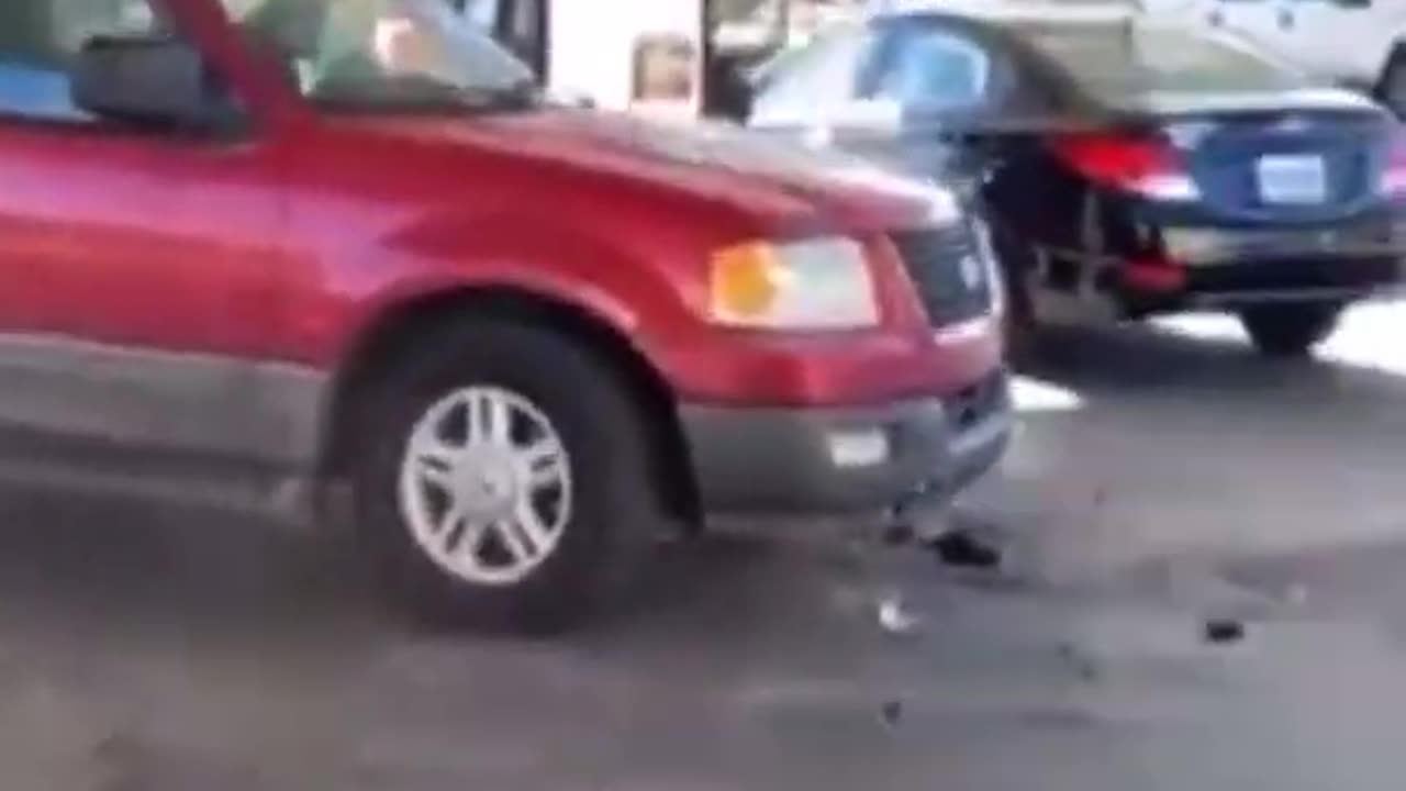 Dude tries to drift his SUV around gas pumps goes wrong