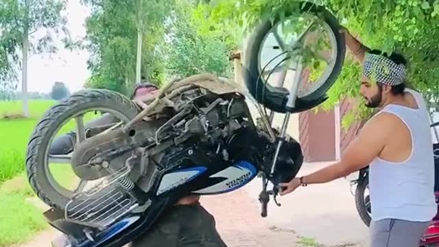 A strong man pushup motorcycle