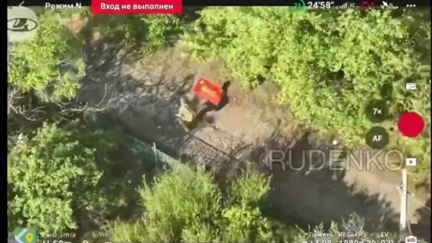 Soldiers of the 114th Brigade Carry the Red Victory Banner Through Karlovka