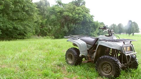 Selling my 4 wheeler. Bear Tracker 250. Smokes like hell, but relliable.