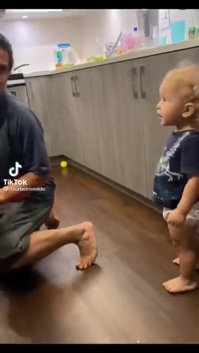 Cute baby karate kicks daddy - Aka The Karate Kid 😄