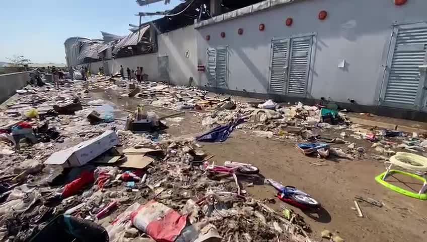 South Africa looting, destruction and cleaning up at Massmart