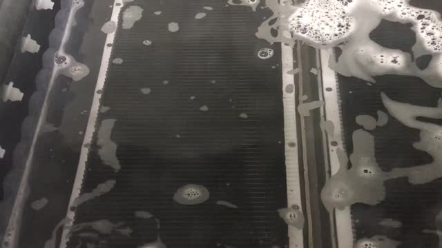 Wafer ultrasonic cleaning